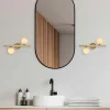 Applique murale art déco dorée, 2 globes blancs L 40 cm SIERRE