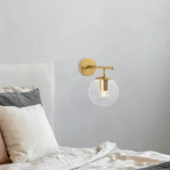 Applique murale art déco dorée, globe blanc sur tige SIERRE