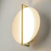 Applique murale dorée – disque blanc minimaliste WINDER