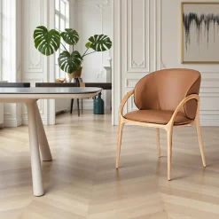 Chaise en cuir terracotta dos rond accoudoirs bois noir ALDER