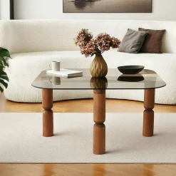 Table basse carrée en verre - pieds bois sculpté BOMA