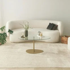 Table basse en verre forme triangle organique pied doré TULUM